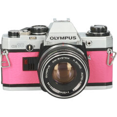 Tweedehands Olympus OM-10 Roze met 50mm F/1.8 CM5678